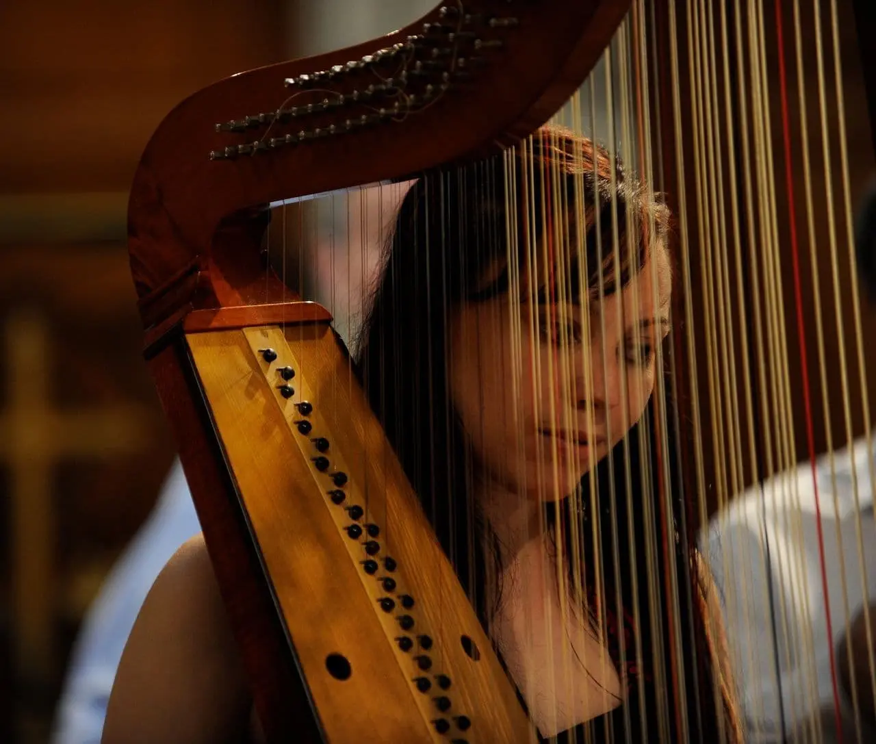 Someone playing the harp